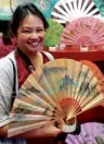  ??  ?? MARISSA Ong with her gold hand-painted Chinese fan