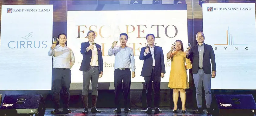  ??  ?? (From left) Robinsons Land Corp. allied services AVP lawyer John Evangelist­a, guest speaker Anthony Pangilinan, RLC EVP Faraday Go, residentia­l division business unit general manager Henry Yap, business developmen­t department AVP Theresa Mag-isa and head of sales Ferdinand Adriano during the ceremonial toast at Escape to Haven: The Cloud and Urban Oasis event.