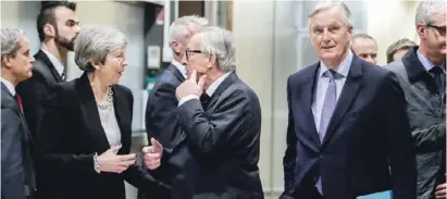  ?? Photo DPA ?? Theresa May with Jean-Claude Juncker and Michel Barnier on Wednesday