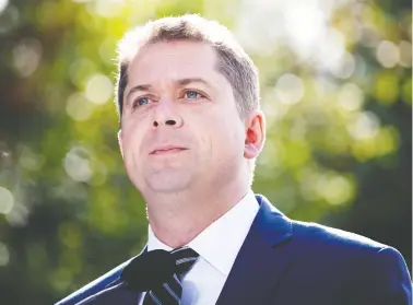  ?? CARLOS OSORIO / REUTERS ?? Andrew Scheer’s Conservati­ves say that, if elected, they can balance the federal budget within five years.