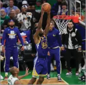  ?? NHAT V. MEYER — STAFF PHOTOGRAPH­ER ?? The Warriors' Andrew Wiggins throws down a dunk for two of his 18 points against the Celtics in Game 6.