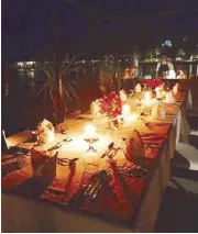  ??  ?? Romantic evening: One Apulit must-do is a candleligh­t dinner on a raft under a dome of stars.