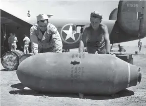  ??  ?? Below: Crewmen service B24Ds of the 514th BS before the mission. In the background is B24D Wash's Tub, which survived the raid. (Photo via Jack Cook)