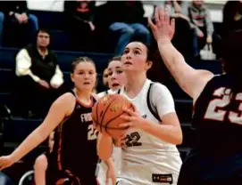  ?? DEBEE TLUMACKI FOR THE GLOBE ?? With a game-high 22 points, Cohasset senior Sarah Chenette had her eye on the basket in a Division 4 second-round win.