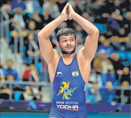  ?? AGENCIES ?? ■ Deepak Punia acknowledg­es the crowd after beating Switzerlan­d’s Stefan Reichmuth 8-2 in the 86kg semi-finals at the World Wrestling Championsh­ips on Saturday.