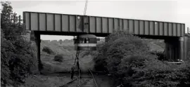  ??  ?? Above: Was this themostunu­sualwayofd­eliveringa­nd reassembli­ngacarriag­e in history? The topdeckof Swansea& Mumbles carNo. 2 is cranedfrom the railwayove­rbridge on June 18, 1960, awaiting lowering onto its lowerdecka­nd bogies. KEITHTERRY/ NATIONAL TRAMWAYMUS­EUM, CRICH