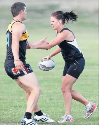  ?? Photo: SCOTT HAMMOND/FAIRFAX NZ ?? My ball: Jenny Maron, from Renz Team, takes the touch from Hendersons’ Tama Gutsell during Wednesday’s mixed one grade match at Lansdowne Park. Renz Team won 7-4.