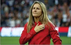  ?? STAFF FILE PHOTO ?? Ex-U.S. player Brandi Chastain taps her chest as she is honored during halftime of an internatio­nal friendly on the Americans’ road to the Women’s World Cup.