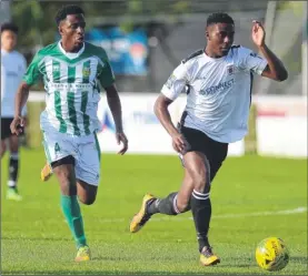  ?? Picture: Gary Browne FM4967771 Buy this picture from kentonline.co.uk ?? Ernest Oxoh on the attack during Faversham’s 3-1 win against VCD Athletic on Saturday