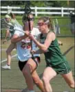  ?? GENE WALSH — DIGITAL FIRST MEDIA ?? Methacton’s Julie Byrne takes control of the ball near Upper Dublin’s Becky Browndorf Tuesday in the District 1-3A playoffs.