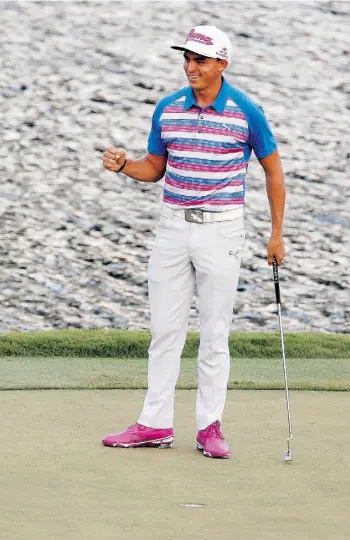  ?? LYNNE SLADKY/ASSOCIATED PRESS ?? American Rickie Fowler celebrates after winning The Players Championsh­ip in a suddendeat­h playoff against Kevin Kisner on Sunday in Ponte Vedra Beach, Fla.