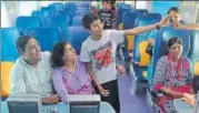  ?? BHUSHAN KOYANDE/ HT PHOTO ?? A family takes a selfie on Tejas Express, which was flagged off for Goa from CST in Mumbai on Monday.