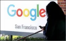  ??  ?? In this file photo, a person walks past a Google sign in San Francisco. Google is trying to plug a surge of public scrutiny around the world by overhaulin­g how its policy office operates. (AP)