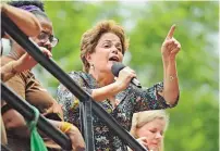  ?? AFP/CARL DE SOUZA ?? Dilma discursou para simpatizan­tes de Lula em Porto Alegre