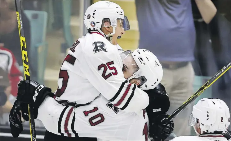  ?? JEFF MCINTOSH/THE CANADIAN PRESS ?? After defeating the Brandon Wheat Kings on Wednesday, Adam Musil, left, and the Red Deer Rebels face a big test against the Rouyn-Noranda Huskies.