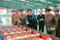  ?? Reuters ?? North Korean leader Kim Jong Un visits the Chollima Building Materials Complex, in this undated photo released by North Korea’s Korean Central News Agency on Wednesday.