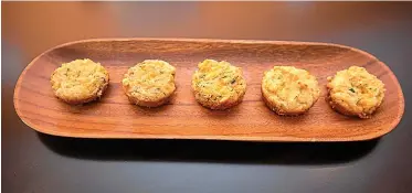  ?? Tribune News Service ?? ■ These cheddar and chive biscuits are a keto version of Red Lobster’s famous biscuits.