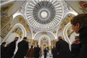  ?? ASSOCIATED PRESS ?? After a rebuilding process that lasted more than two decades, the Greek Orthodox church destroyed in the Sept. 11 terrorist attacks has reopened.