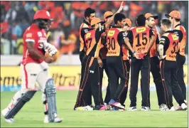  ??  ?? Sunrisers Hyderabad team celebrate the wicket of Nikhil Naik during the match.