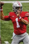  ?? JAY LAPRETE/ ASSOCIATED PRESS ?? Ohio State quarterbac­k Justin Fields, a seniorwhow­as third in Heisman Trophy voting last year, passed for 276 yards and two touchdowns in a 52- 17win over Nebraska.