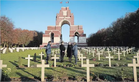  ?? CHRISTOPHE­R FURLONG
GETTY IMAGES ?? Prime Minister Theresa May and President Emmanuel Macron at a wreath-laying ceremony at Thiepval Memorial on Friday in France.