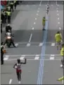  ?? CHARLES KRUPA — THE ASSOCIATED PRESS ?? Geoffrey Kirui, of Kenya, leads Galen Rupp, of the United States, as he heads to the finish line to win the 121st Boston Marathon on Monday in Boston.