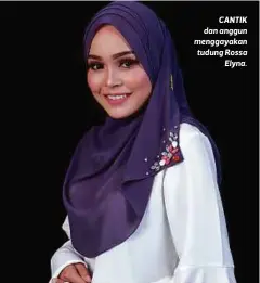  ??  ?? CANTIK dan anggun menggayaka­n tudung Rossa
Elyna.