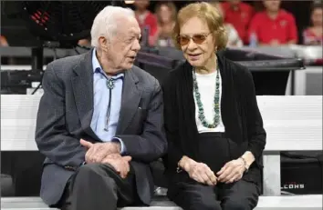 ?? John Amis/Associated Press ?? Former President Jimmy Carter and Rosalynn Carter are seen ahead of an NFL football game between the Atlanta Falcons and the Cincinnati Bengals in Atlanta on Sept. 30, 2018.