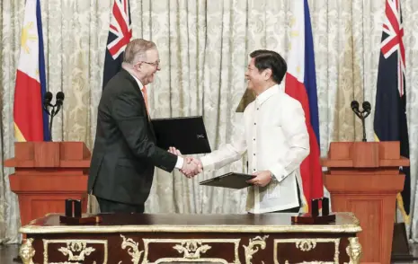  ?? ?? Prime Minister Anthony Albanese and President Ferdinand R. Marcos, Jr. sign a Joint Declaratio­n on Strategic Partnershi­p at Malacañan Palace, September 2023. The elevation of the bilateral relation between Australia and the Philippine­s formalizes what is an already broad range of cooperatio­n based on similar values and shared vision for the region