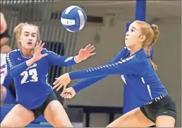  ?? Steven Eckhoff ?? Armuchee’s Kyleigh Powell (right) goes after the ball in front of teammate Emily Tomlin during a match against Model on Thursday in Armuchee.