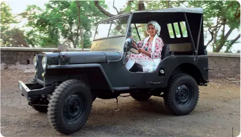  ??  ?? WHERE THERE’S A WILLYS... The resident princess of Jehanuma Palace, at the wheel of her prized possession