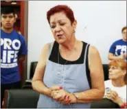  ??  ?? In this July 28, 2009 file photo, Norma McCorvey, right, the plaintiff in the landmark lawsuit Roe v. Wade, speaks up as she joins other anti-abortion demonstrat­ors inside House Speaker Nancy Pelosi’s office on Capitol Hill in Washington.d was with her...