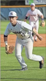  ?? Scott Herpst ?? Gordon Lee first baseman Garren Ramey charges in on a bunt attempt during Friday’s 6-4 victory over Trion. The win moved Gordon Lee to 10-1 in Region 6- A play with four games left at the start of the week.