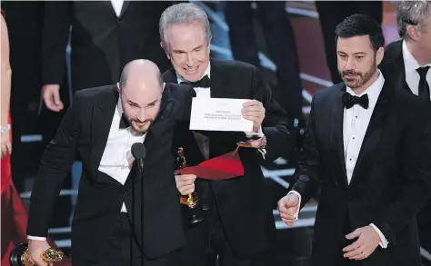  ?? CHRIS PIZZELLO/THE ASSOCIATED PRESS ?? The Oscars’ ultimate “oops” moment: Warren Beatty smiles through clenched teeth after he and Faye Dunaway mistakenly announced La La Land as the best picture winner at last year’s Academy Awards. The real winner was Moonlight.