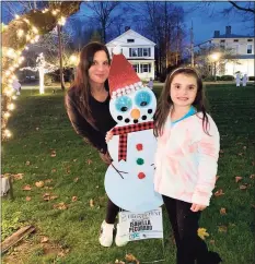  ?? Contribute­d photo ?? The Milford Prevention Council’s Frosty Fest fundraiser has resulted in 300 decorated snowmen popping up on Milford Green.