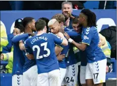  ?? Photo: AFP ?? Everton’s Brazilian striker Richarliso­n (centre) celebrates his goal against Chelsea last Sunday (May 1).