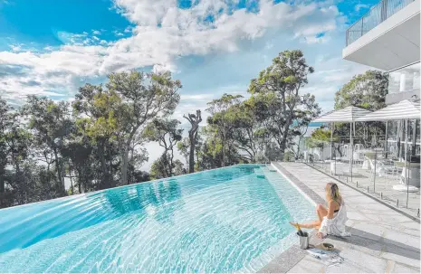  ?? ?? From its famous infinity pool to Mexican eatery Julio’s, treetop views are a never-ending treat at Bannisters Port Stephens. Pictures: Ben Mack Images