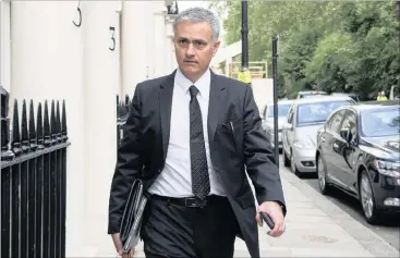  ?? Picture: WILL OLIVER, EPA ?? HE’S THE ONE: Jose Mourinho arrives at his home in Central London.
