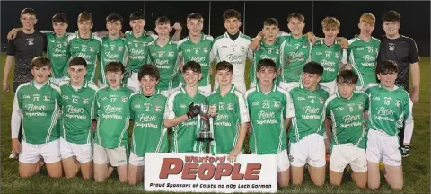  ??  ?? The successful Naomh Eanna squad with the Joe Brennan Memorial Cup after retaining their title.