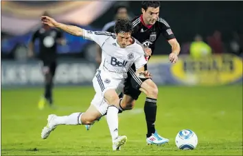  ?? — GETTY FILES ?? John Thorringto­n battles for the ball against D.C. United last year. The midfielder, recently back from injury, is relishing the Caps’ clash with red-hot San Jose.