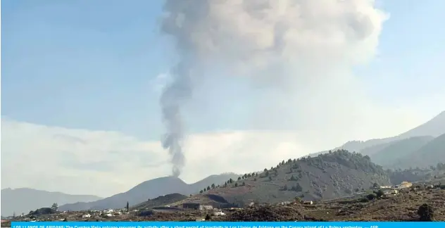  ?? — AFP ?? LOS LLANOS DE ARIDANE: The Cumbre Vieja volcano resumes its activity after a short period of inactivity in Los Llanos de Aridane on the Canary island of La Palma yesterday.