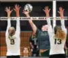  ?? RANDY MEYERS — THE MORNING JOURNAL ?? Tory Small of Amherst taps the ball in between Gillian Romanchok and Emma Abfall of Avon during the first set.