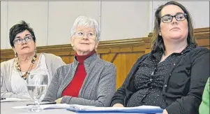  ?? RYAN ROSS/THE GUARDIAN ?? Jillian Kilfoil, right, Marie Burge, centre, and Marcia Carroll listen to one of the speakers during a Jan. 9 press conference in Charlottet­own as they call for an update to the Employment Standards Act. The three are members of P.E.I.’s Working Group...