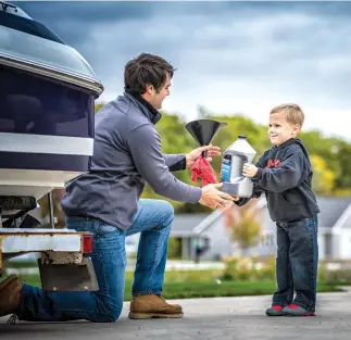  ??  ?? Changing the oil is a quick, straightfo­rward task. Do it regularly to ensure a long service life from your outboard.