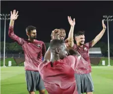  ?? ?? Qatar players during a training session at the Aspire Academy yesterday.