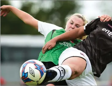  ??  ?? Rianna Jarrett battling it out against Chloe Moloney of Peamount United.