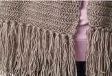  ??  ?? A fringe, made from lengths of yarn folded over and hooked in, is the perfect trim finish