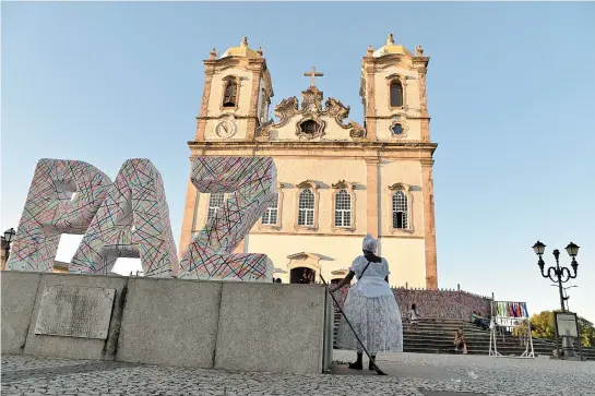  ?? PAULA FRÓES ?? Apesar do monumento à Paz em frente ao templo, basílica do Bonfim é alvo de disputa