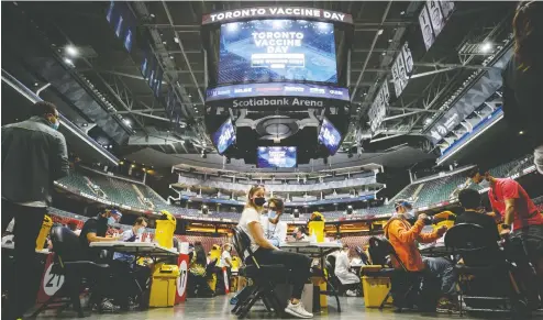  ?? THE CANADIAN PRESS ?? Scotiabank Arena in Toronto was turned into a mass vaccinatio­n clinic in the push to get people vaccinated accelerate­s in the face of variants .