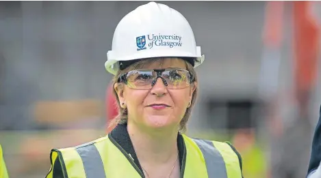  ?? PA. ?? Ms Sturgeon visited Glasgow University’s new learning hub to mark the publicatio­n of the GERS statistics.